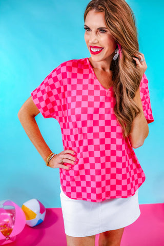 Checked out tunic top